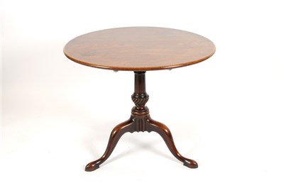 Lot 774 - A George III mahogany snap-top tripod table