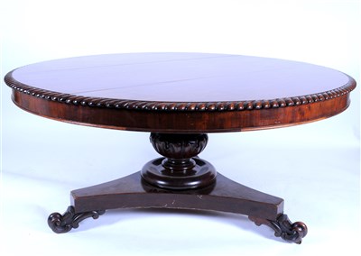 Lot 710 - A large Victorian plumb pudding mahogany veneered dining table