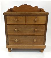 Lot 796 - A pine chest of drawers