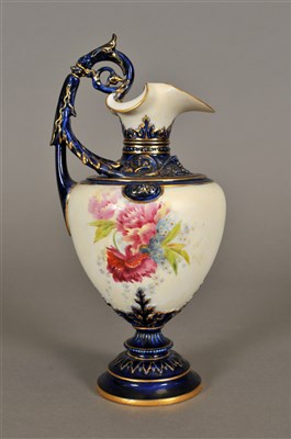 Lot 192 - A Royal Worcester blush ivory and cobalt ewer