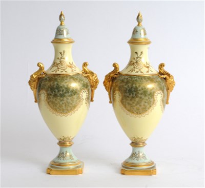 Lot 66 - A pair of Coalport vases and covers