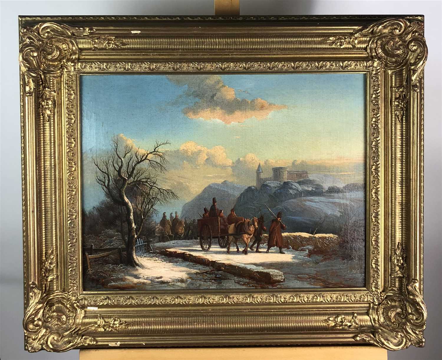 Lot 88 - A continental oil study of soldiers marching before a distant castle