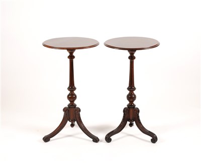 Lot 672 - A pair of Victorian walnut and maple veneered tripod occasional tables