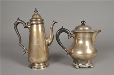 Lot 63 - A silver coffee pot and a silver hot water jug