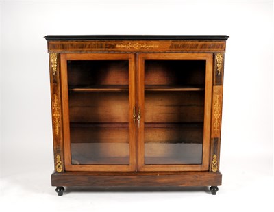 Lot 612 - A 19th century inlaid glazed bookcase / display cabinet