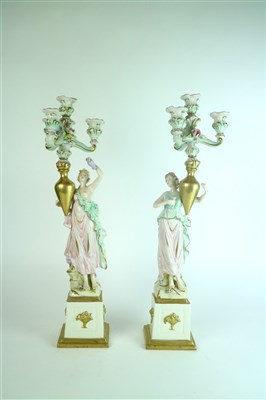 Lot 410 - A pair of Capodimonte porcelain candelabra