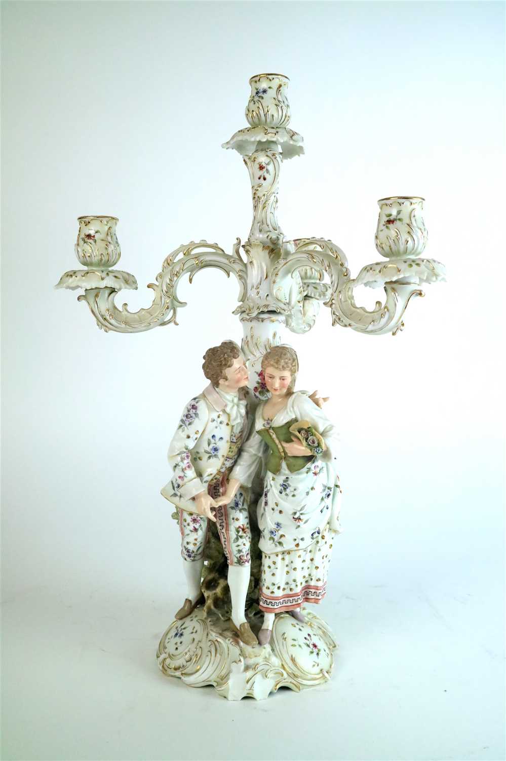 Lot 411 - A Continental porcelain candlebrum