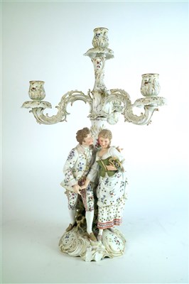 Lot 411 - A Continental porcelain candlebrum