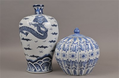 Lot 256 - A tall reproduction Chinese blue and white ceramic vase and another