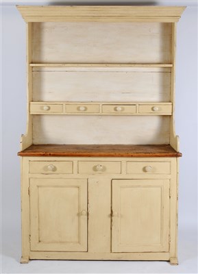 Lot 818 - A large rustic painted pine kitchen dresser