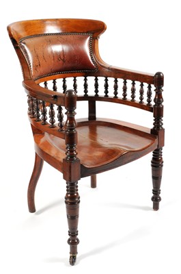 Lot 665 - An Edwardian mahogany framed office desk chair with a leather upholstered back