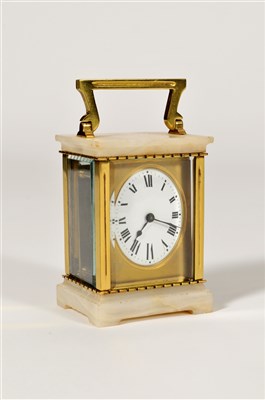 Lot 159 - A brass and onyx cased carriage clock and one other