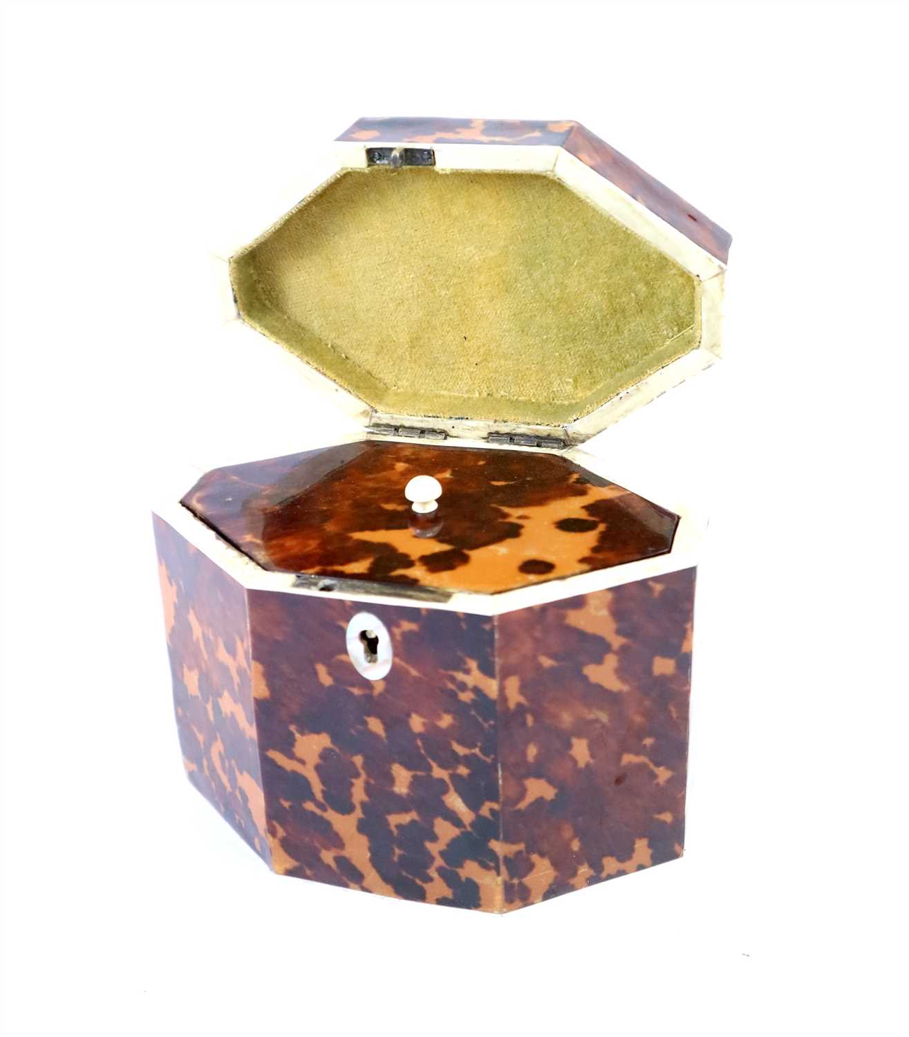 Lot 688 - A George III tortoiseshell tea caddy
