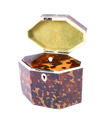 Lot 688 - A George III tortoiseshell tea caddy