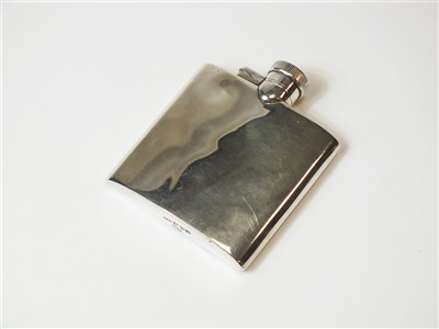 Lot 259 - An Asprey silver hip flask