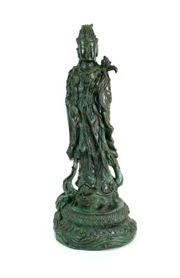 Lot 331 - A decorative cast metal figure of Guan Yin, another of the seated Buddha