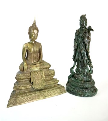 Lot 331 - A decorative cast metal figure of Guan Yin, another of the seated Buddha