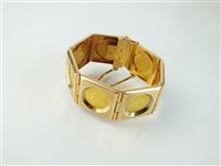 Lot 179 - A coin set panel bracelet