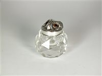 Lot 79 - An Edwardian novelty silver topped inkwell