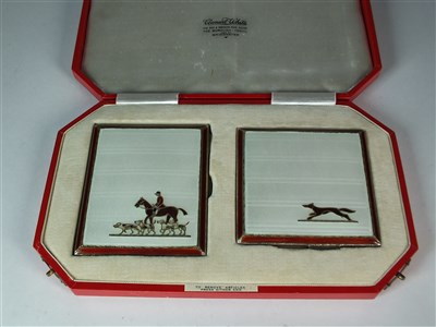 Lot 105 - A cased silver and guilloche enamel cigarette case and compact set