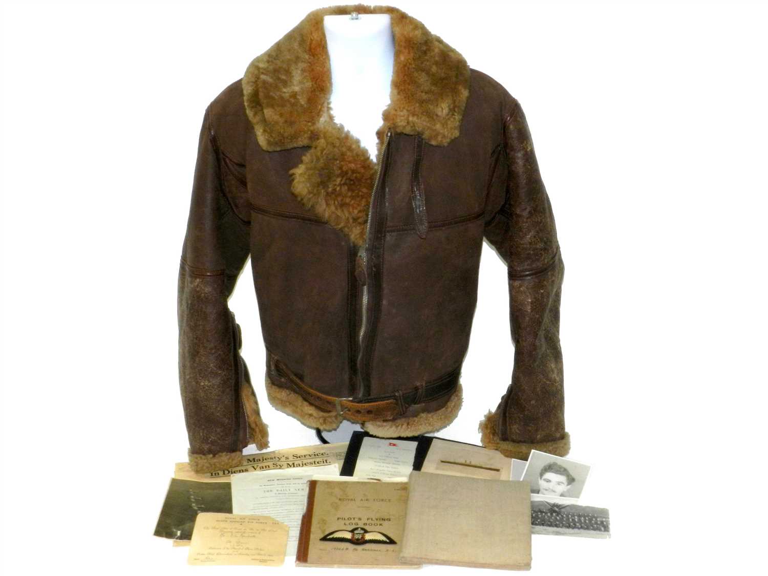 Lot 547 - WW2 leather flying jacket, log books and provenance