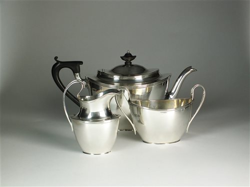 Lot 57 - A three piece silver tea service