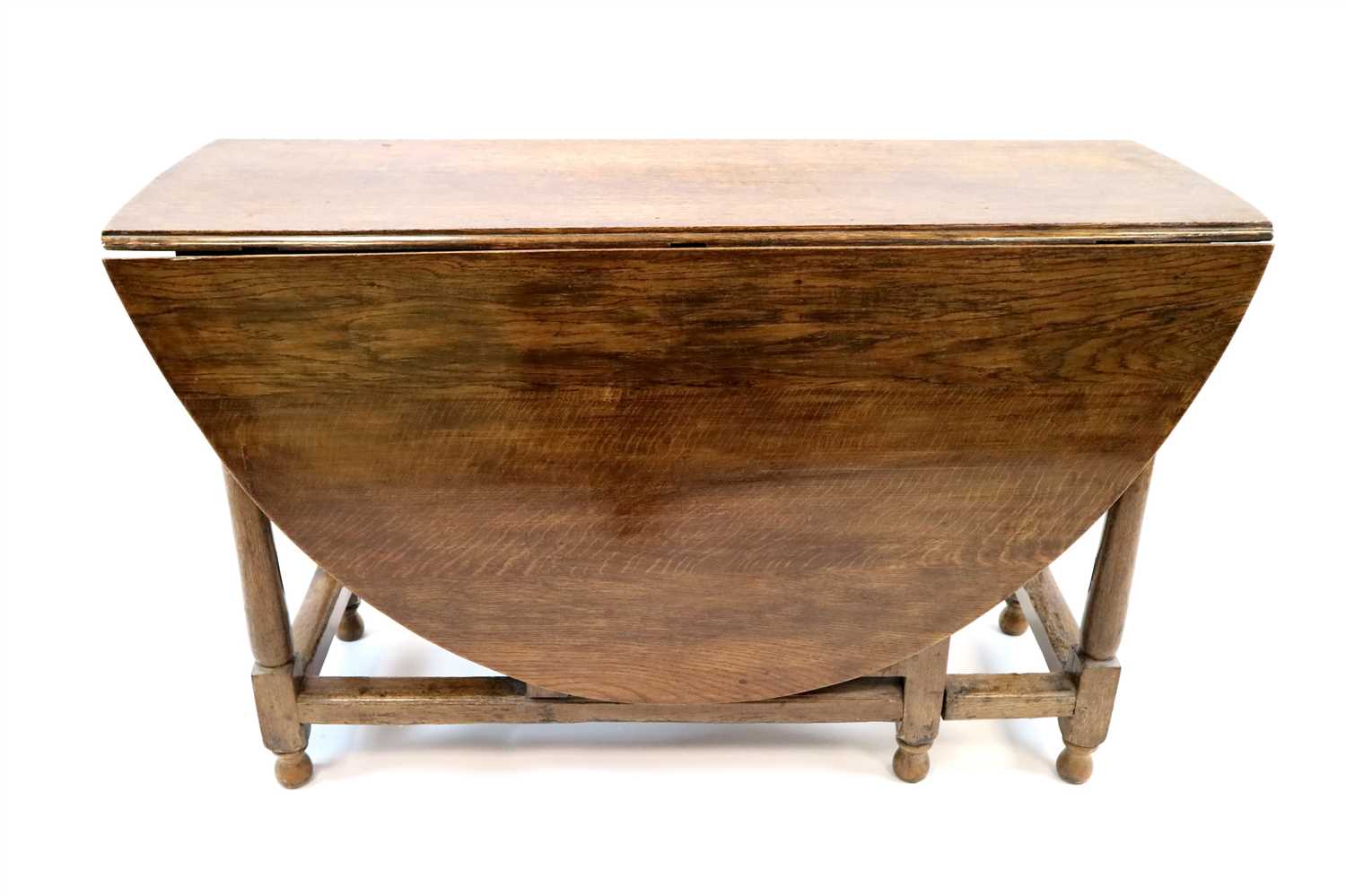 Lot 437 - A 19th century oak gateleg dining table