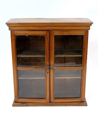 Lot 483 - A small pitch pine bookcase