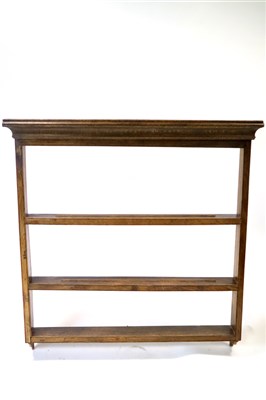 Lot 488 - A 19th century country oak three-tier wall-hanging dresser / plate rack