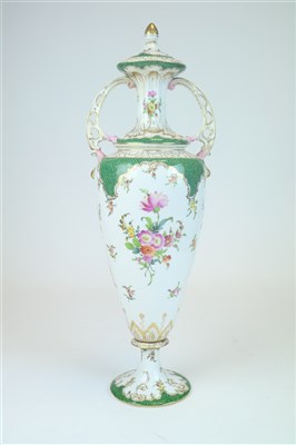 Lot 430 - A tall twin handled Dresden porcelain vase and cover