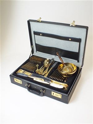 Lot 268 - A gilt plated canteen of cutlery and brass wares