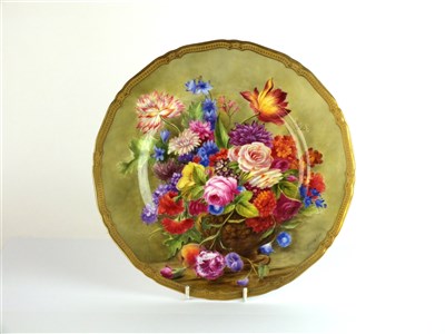 Lot 432 - A Royal Worcester floral-painted cabinet plate by Ernest Barker