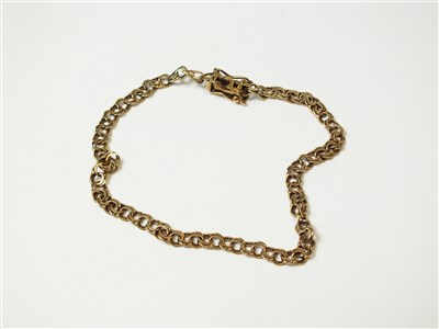 Lot 295 - A yellow metal decorative link bracelet