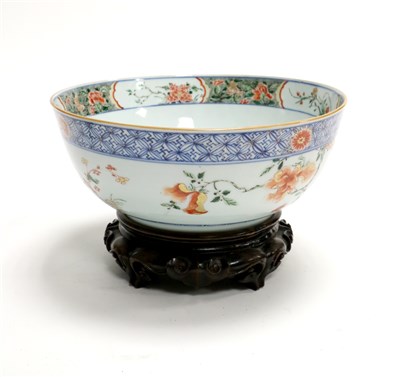 Lot 543 - A Chinese export porcelain bowl with hardwood stand