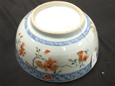 Lot 543 - A Chinese export porcelain bowl with hardwood stand