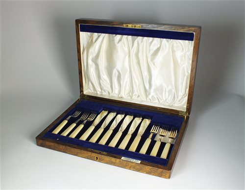 Lot 92 - A cased set of silver fish knives and forks