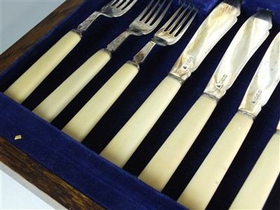 Lot 92 - A cased set of silver fish knives and forks