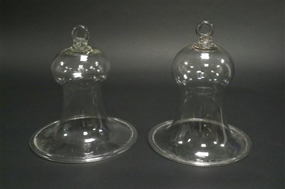 Lot 451 - A pair of large glass bells and a glass baluster vase