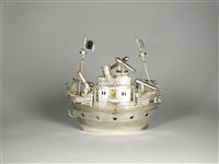 Lot 68 - A white metal model of a ship