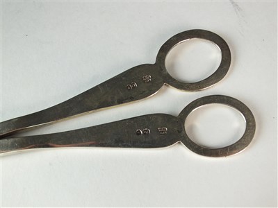 Lot 82 - A cased pair of silver grape scissors