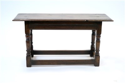 Lot 913 - An old country oak window seat or hall stool