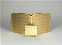Lot 130 - A 9ct gold cigarette case and vesta case