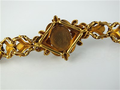 Lot 178 - A mid-19th century cabochon garnet bracelet