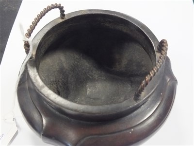 Lot 502 - A Chinese bronze censer bearing six character Ming marks to underside