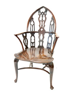 239 - An unusual 18th century vernacular gothic Windsor armchair