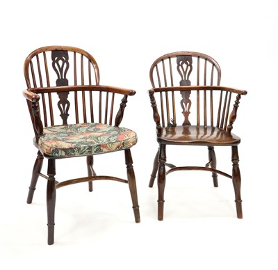 Lot 247 - A closely associated set of four 18th century Windsor stick back kitchen chairs