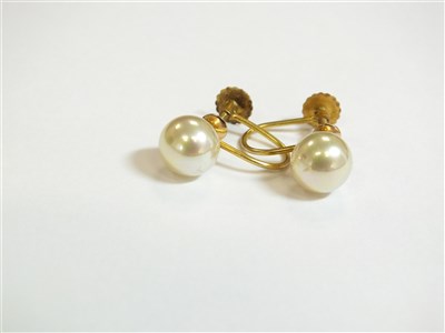 Lot 18 - Two rings and a pair of earrings