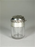 Lot 181 - A silver topped glass jar