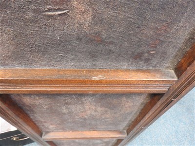 Lot 505 - An early 20th century studded leather oak framed four sectional screen / room divider