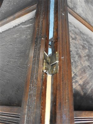 Lot 505 - An early 20th century studded leather oak framed four sectional screen / room divider